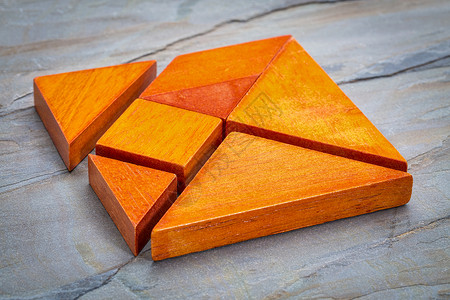 7 幅图拼图粮食石头三角形板岩红色正方形七巧板橙子木头背景图片