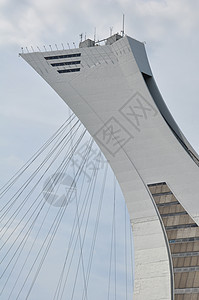 加拿大蒙特利尔奥林匹克运动会体育场竞赛建筑游戏阴影游客蓝色五环旅行棒球旗帜背景图片