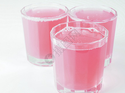粉红葡萄果汁西柚汁玻璃天堂酒店水果早餐眼镜红色葡萄柚酒吧背景图片