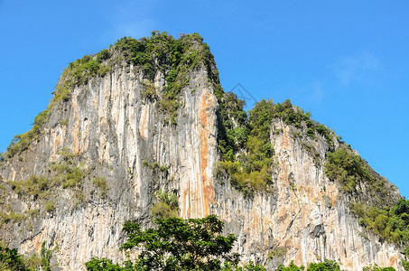 高悬崖情调场景条纹天空石灰石白色顶峰风景石头岩石背景图片