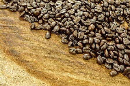 木制背景的咖啡豆时光咖啡公司咖啡馆咖啡时间早餐咖啡厂休闲火锅烘烤背景图片