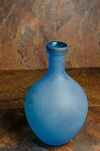蓝瓶瓶子玻璃石头岩石背景图片