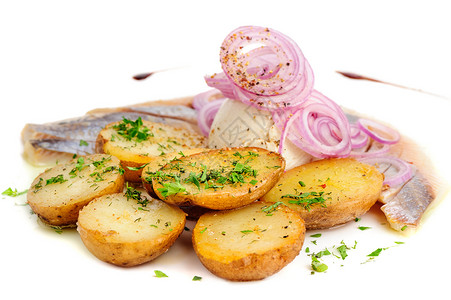 烤土豆和洋葱香料生物烤箱香菜咸鱼草本植物蔬菜乡村美食地面背景图片