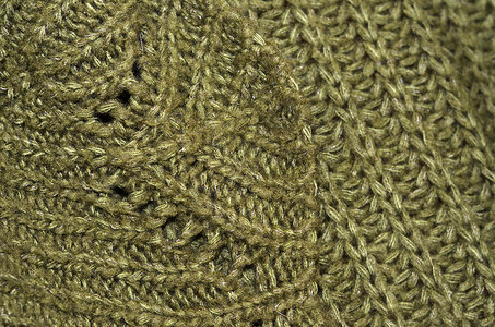 毛衣结构细节绿色花边钩针针织蕾丝衣服纤维背景图片