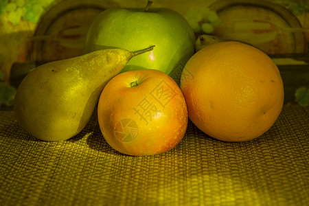 果实静态生命黄色橙子红色稻草食物绿色背景图片