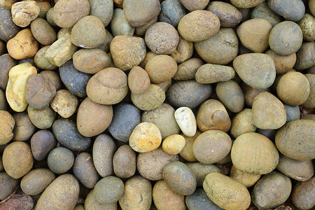 颗粒石石头椭圆形矿物卵石岩石圆形圆圈鹅卵石背景图片