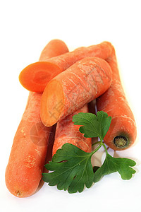 胡萝卜橙子收获萝卜收成蔬菜维生素根菜白色紫色黑色背景图片