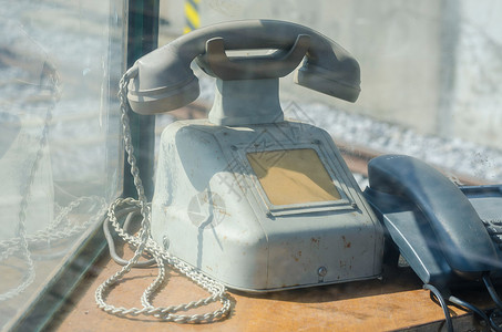 旧电话听筒线条家用机摄影电缆拨号塑料商业乐器名片背景图片