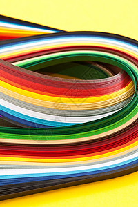 彩色纸条黄色蓝色施工工艺材料多样性绿色红色彩虹光谱背景图片
