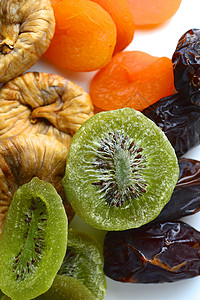 狗枣猕猴桃干枯水果食物甜食干枣猕猴桃绿色干货健康饮食橙子背景