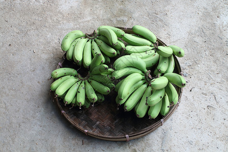 受难者的香蕉水果乡村裙撑收成篮子绿色农业食物文化背景