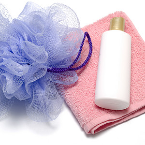 泡泡浴液肥皂和毛巾擦洗卫生身体洗手液化妆品治疗蓝色产品浴室温泉背景