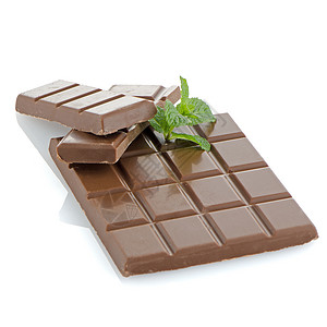 巧克力的封闭细节糖果诱惑白色可可甜点小吃营养薄荷芯片美食背景图片