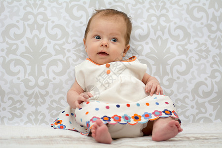 美丽的小女婴小姑娘裙子快乐婴儿童年背景图片