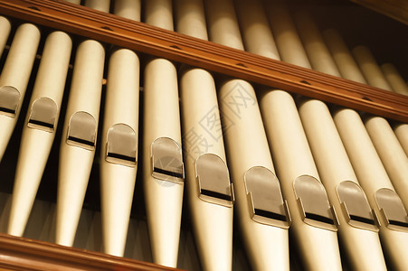 教堂风琴器官管管教堂管风琴教会金子古典音乐管道谐振仪器乐器琴管背景