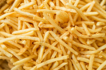 薯条土豆蔬菜黄色小吃饮食食物油炸背景图片