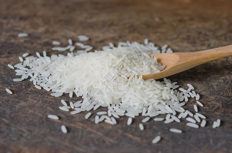 白稻谷文化棕色谷物勺子粮食食物营养种子美食白色背景图片