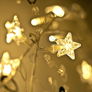 带星星的圣诞灯光正方形新年水平庆典彩灯黄色派对圣诞星形背景图片