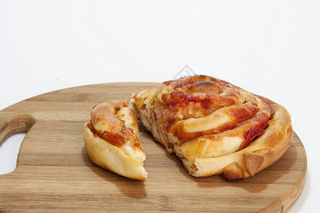 面包店的新鲜糕点木板早餐食物木头背景图片