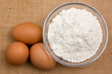 鸡蛋和面粉面包谷物美食木板餐厅饮食厨房木头糕点传统背景图片