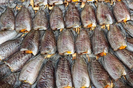 班斯科市市场上的鱼类保健食物尾巴动物饮食营养贸易店主交易交换背景