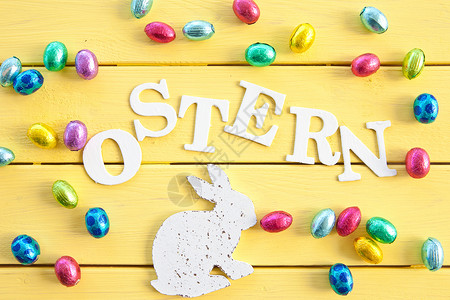 复活节巧克力蛋糖果黄色食物巧克力兔子乡村装饰字母贺卡圆点背景图片