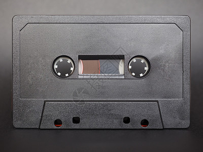 磁带盒模拟记录音乐磁带黑色背景图片