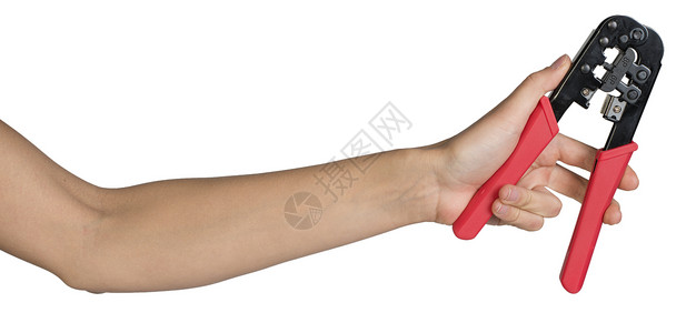 女性用手抓着电钳乐器硬件工具连接器维修金属水平卷边剪子手臂背景图片