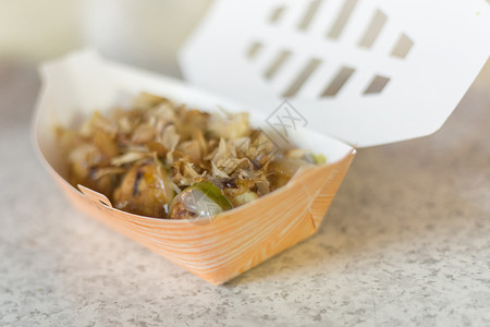 夜市的塔戈亚基小吃饺子烹饪美食食物街道章鱼盘子棕色油炸背景图片