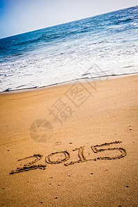 2015年被刻在沙滩上的沙子中冲浪工作决议相机日历海岸海洋海滩新年规划师背景图片