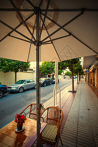 2013年6月23日 西班牙加泰罗尼亚州2013年6月23日 阿文达公司咖啡馆人行道照片街道咖啡馆太阳桌子椅子气候午餐菜单背景