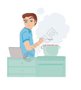 过节时的厨房男人在家厨房做饭时看笔记本电脑设计图片