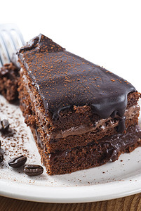 巧克力蛋糕咖啡巧克力盘子蛋糕食物背景图片