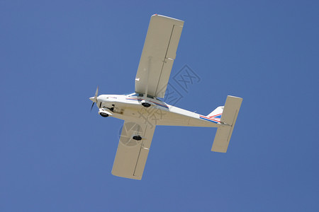 小型飞机旅行航班飞行翅膀飞行器天空空气私人蓝色航空背景图片