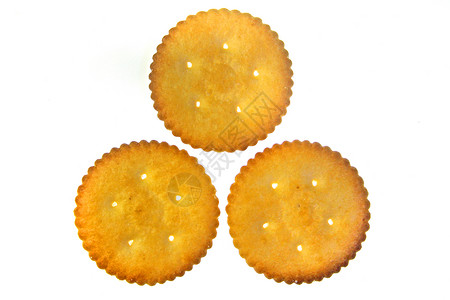 饼干 咸饼干圆圈黄色食物饮食棕色甜点烘焙宏观产品小吃背景图片