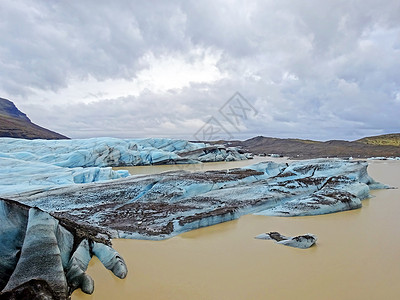 冰山高清素材冰石漂浮在冰岛的Jokulsarlon环礁湖上沙龙冰川冰山海洋土地瀑布蓝色背景