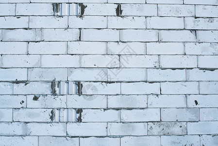 白砖墙建筑学接缝石墙建造白色材料水泥砂浆水平石方背景图片