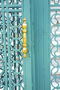 金属生锈的棕色摩洛哥在非洲老木绿金指甲出口安全建筑学入口古董挂锁建筑钥匙木头背景图片