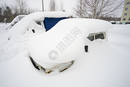 雪底下的机器运输院子街道背景图片