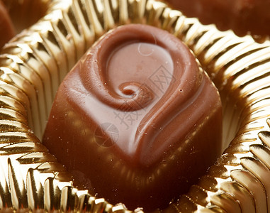 巧克力甜甜糖特写夹心纯牛奶大豆食品糖果口粮蛋糕紧身裤食物甜点背景图片