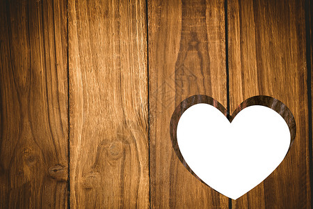 在木柴中切出心脏浪漫情人木头背景图片