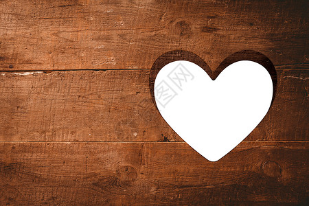 在木柴中切出心脏木头情人浪漫背景图片