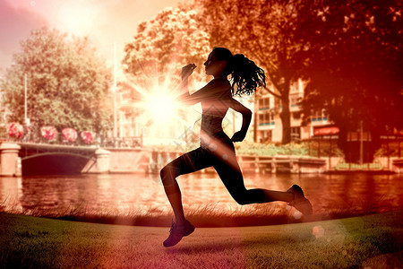 健康妇女全年慢跑的复合图象混血马尾辫太阳身体训练棕色体力运动风光锻炼背景图片