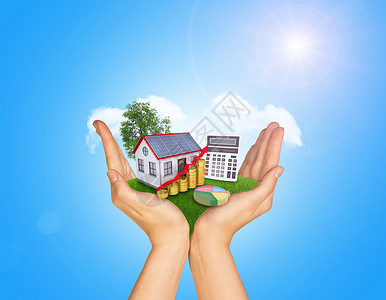 手板模型手握着绿草和房屋在地面上 本底是站立的树和云太阳能板太阳山墙图表树叶房子饼形水管绿色棕榈背景