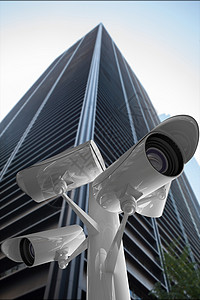 Ccctv 相机复合图像摩天大楼建筑监视拍摄蓝天商业阳光城市安全晴天背景图片