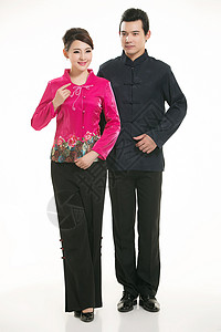 白色背景面前穿着中国服装服务员的服饰棉袄迎宾围裙烹饪人员快乐微笑旗袍职员食堂背景图片