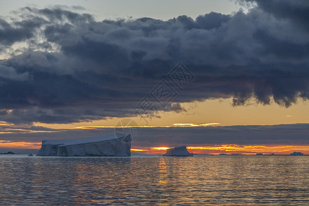海洋冰午夜太阳     德雷克通过南极洲地平线海景旅行旅游天空冰山日落风景海洋背景