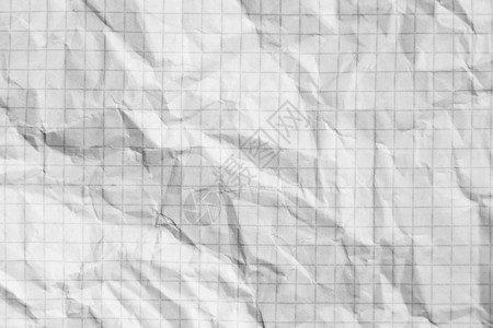 表面折叠格纸的一部分 宏损害瓦楞床单灰色平方笔记本空白宏观墙纸背景图片