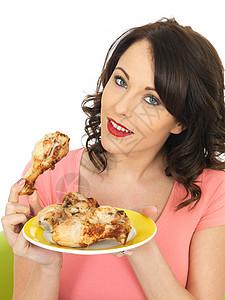 女孩吃冷煮鸡腿重量午餐女士小吃摄影控制低脂肪食物成人倾斜背景图片