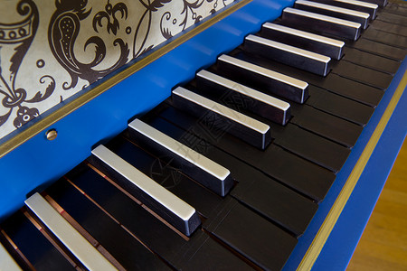 旧的竖琴键盘 近视钥匙风景钢琴蓝色黑色古董乐器音乐高清图片